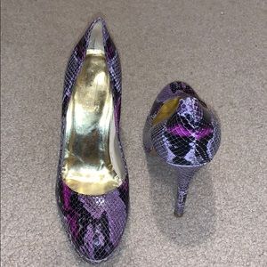 Size 7.5 purple “snake skin” pattern Coach heels